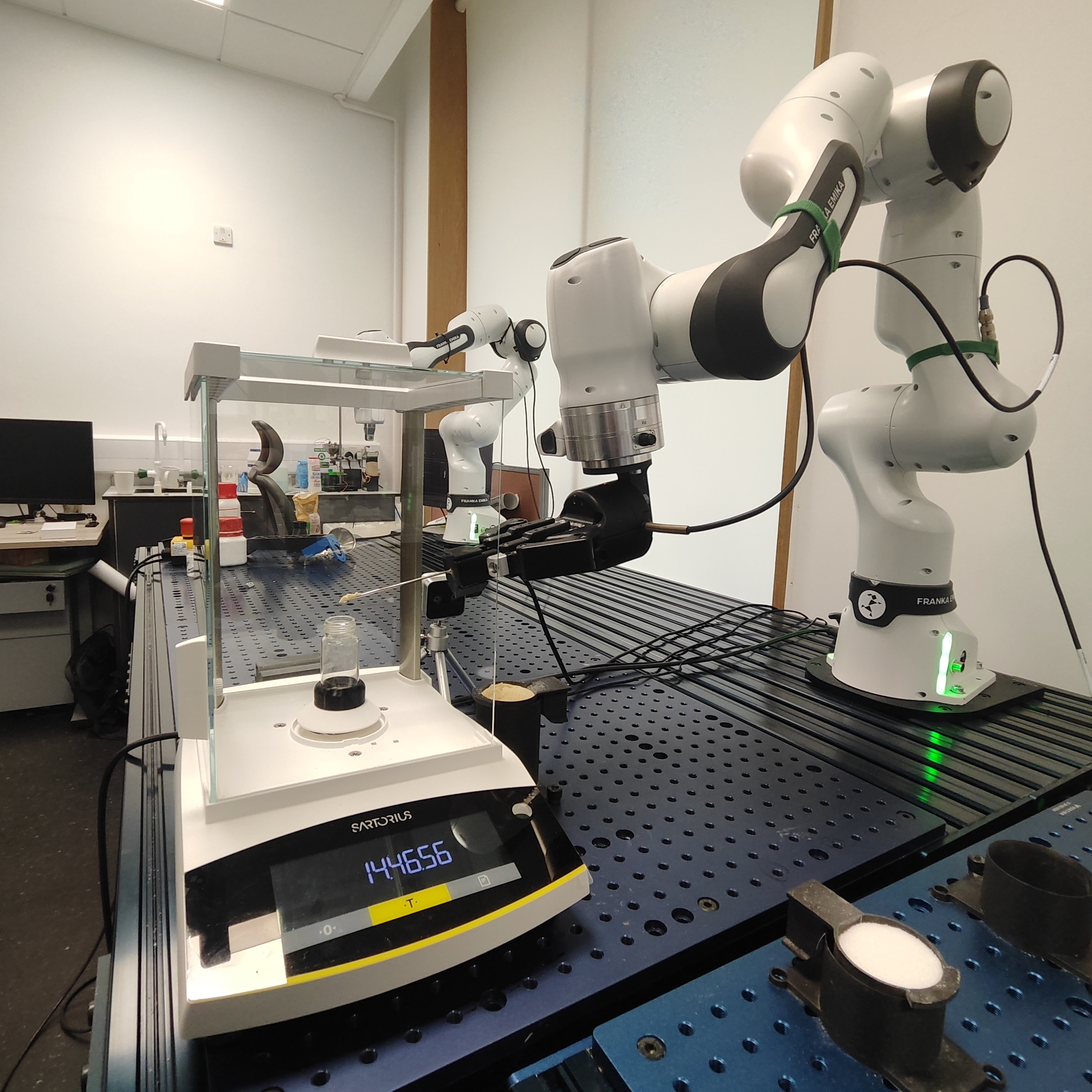 Vision-guided adaptive scooping for powder weighing in autonomous chemistry laboratories